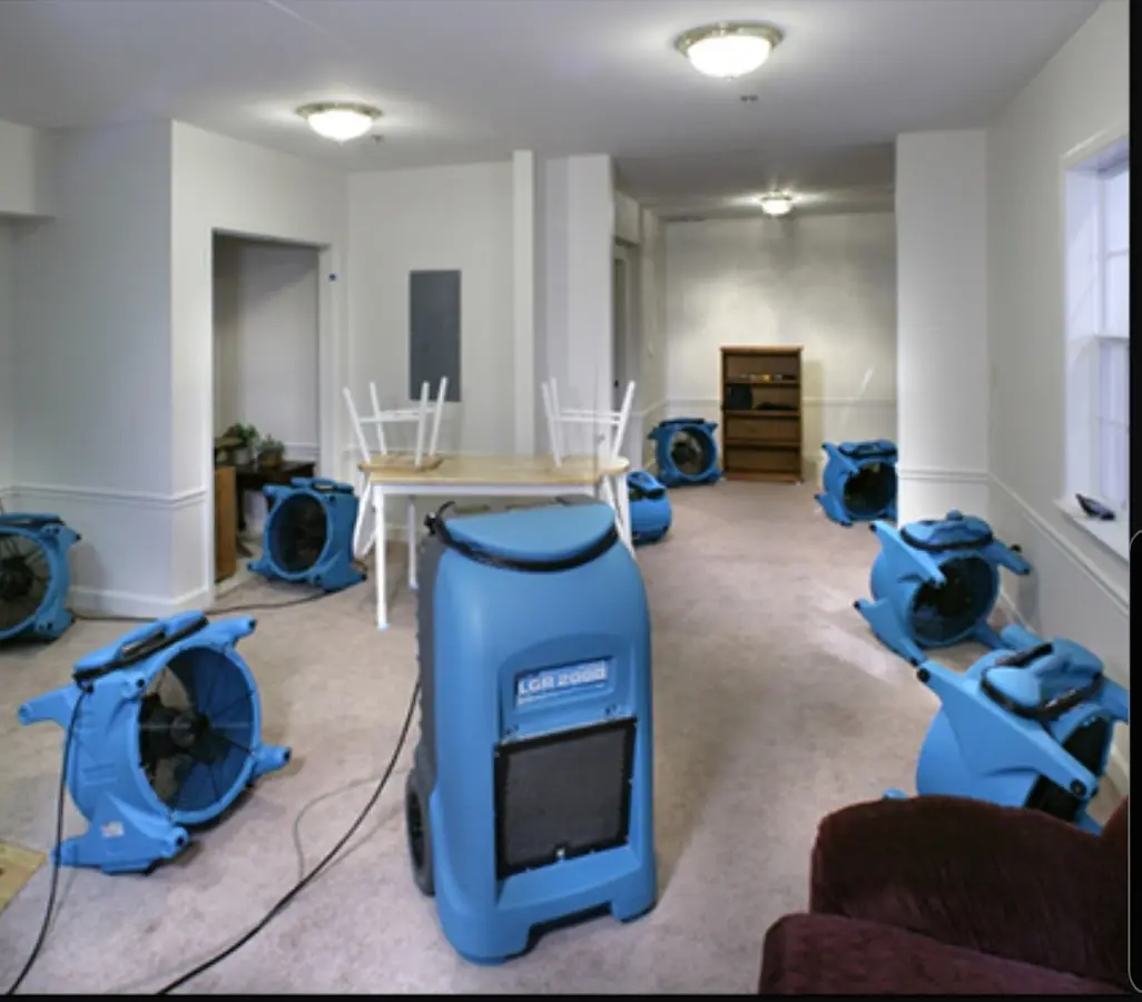 Air movers and dehumidifier setup for Water Damage Restoration in Cary